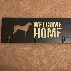 Welcome home distressed sign with dog outlined